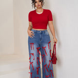 Women Plus High-Waisted Wide-Leg Denim Pants with Red Ribbon Detailing