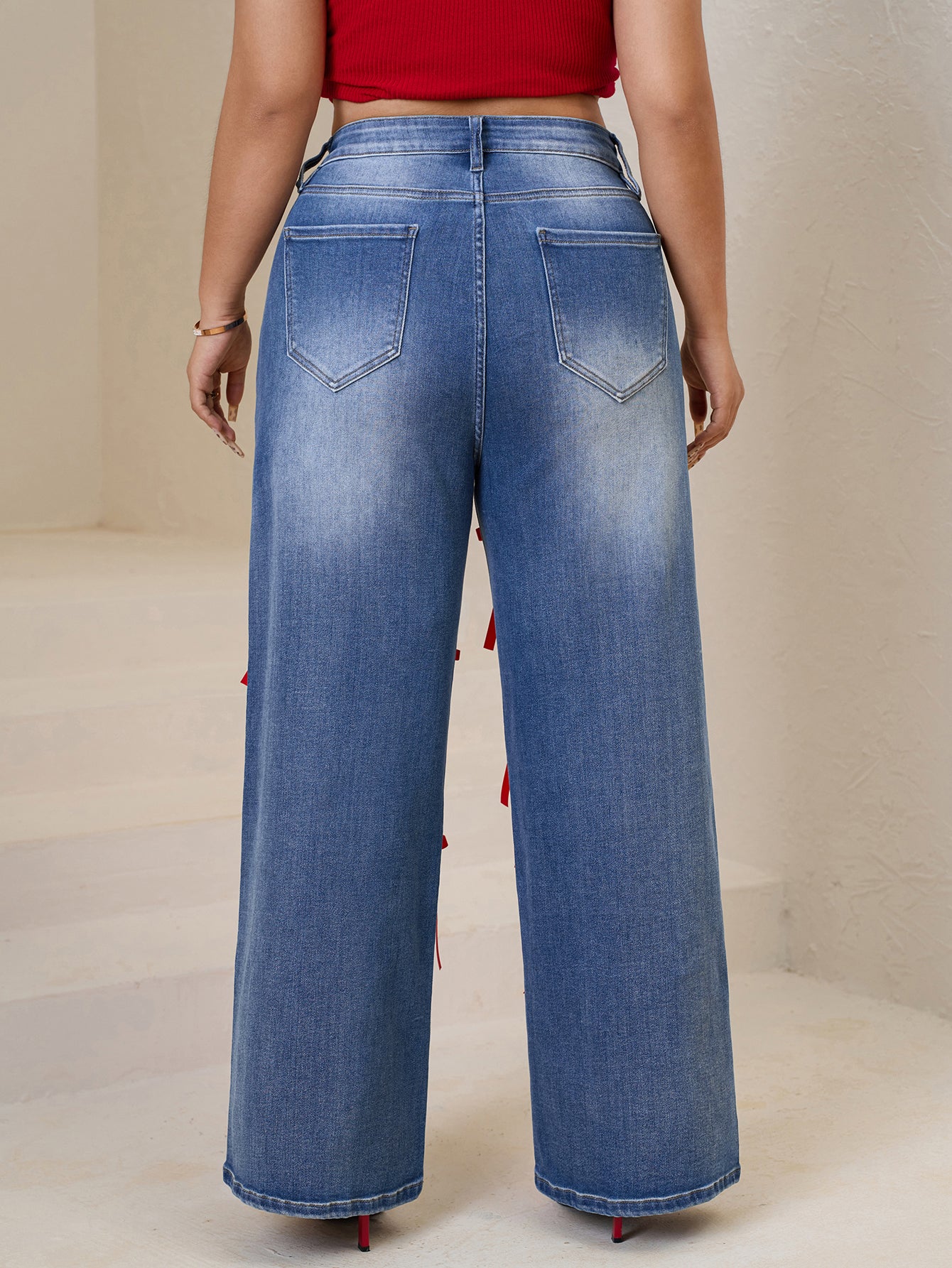 Women Plus High-Waisted Wide-Leg Denim Pants with Red Ribbon Detailing